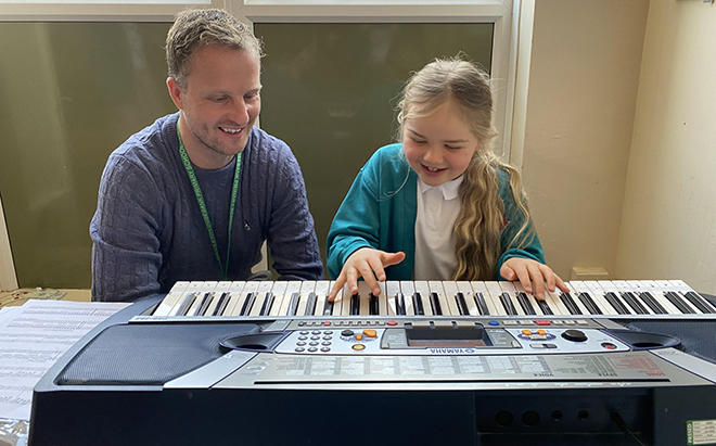 mr-crilley-teaching-piano